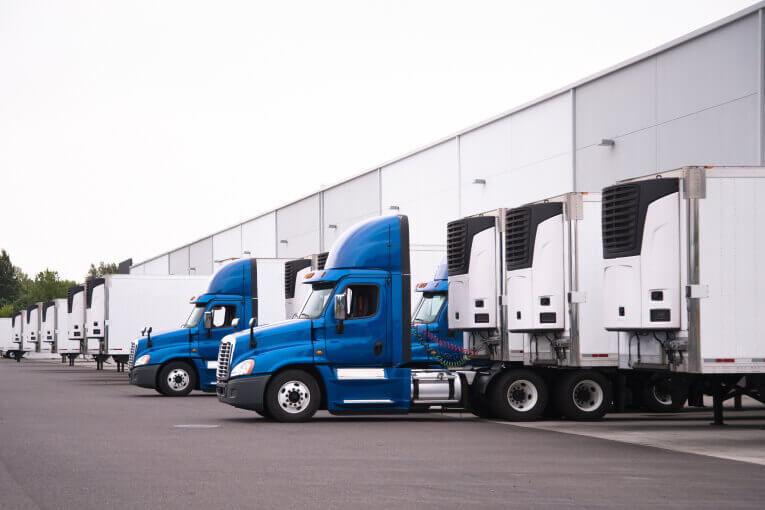 LTL freight staged at warehouse loading docks